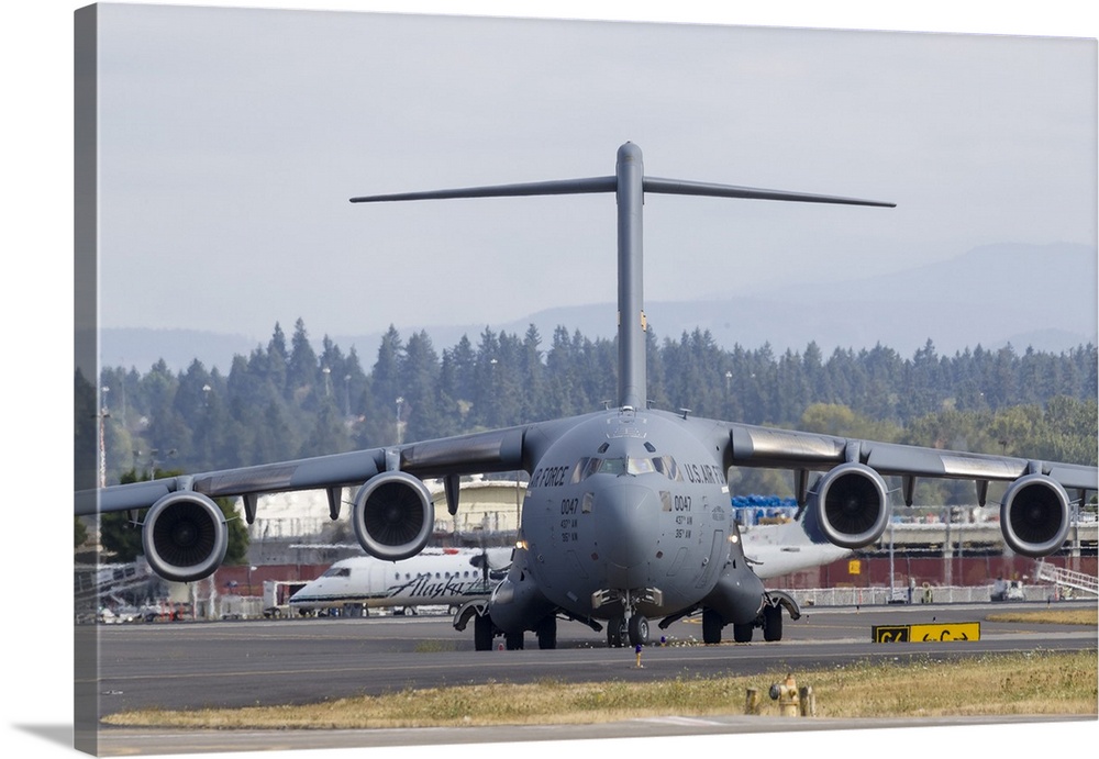 A U.S. Air Force C-17 Globemaster III taxis in after landing at Portland International Airport, Oregon.