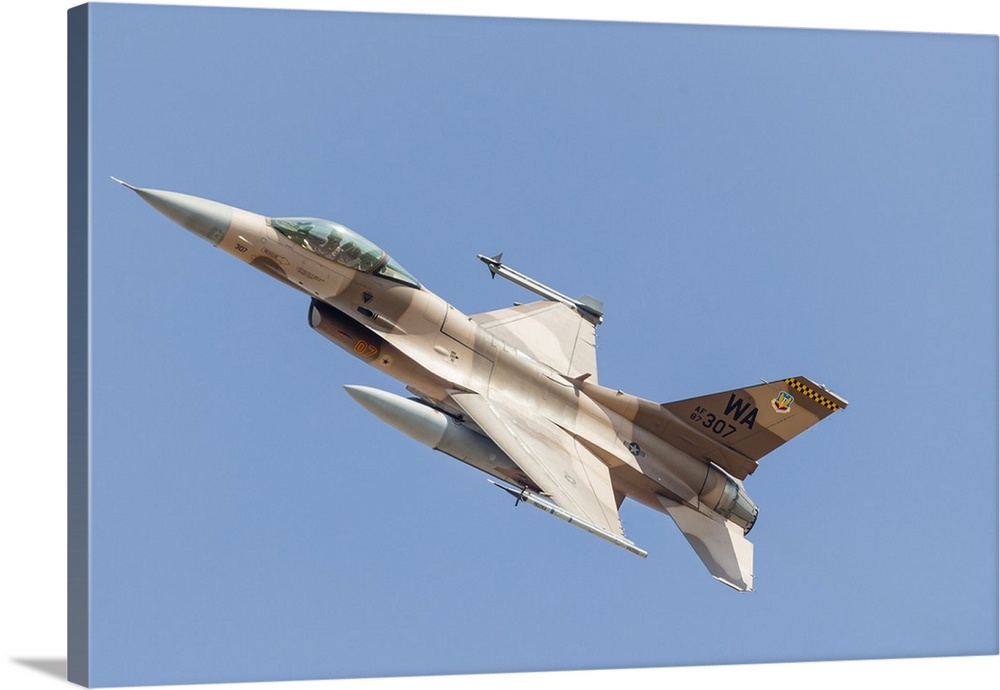 A U.S. Air Force F-16C aggressor launches out of Nellis Air Force Base, Nevada, on a Red Flag mission.