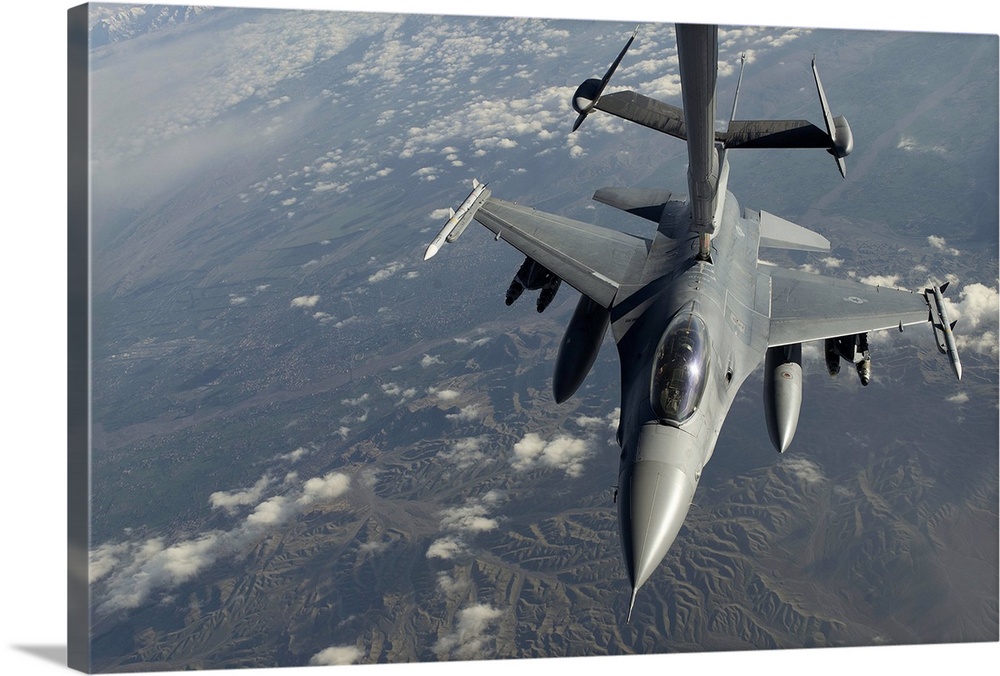 April 2, 2014 - A U.S. Air Force F-16C Fighting Falcon conducts aerial refueling with a KC-10 Extender advanced aerial tan...