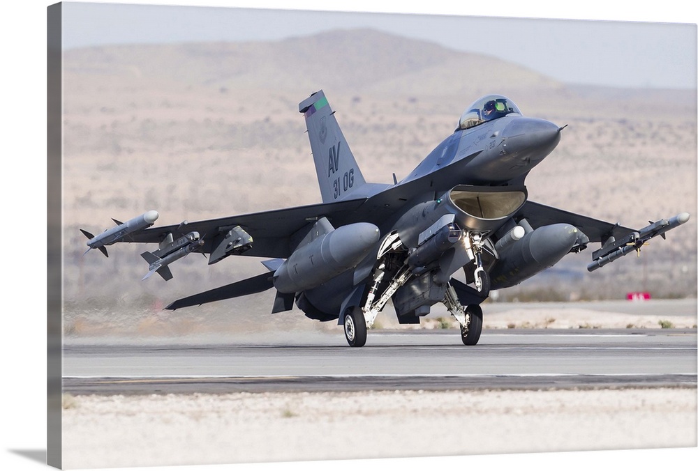 A U.S. Air Force F-16C Fighting Falcon landing at Nellis Air Force Base, Nevada.