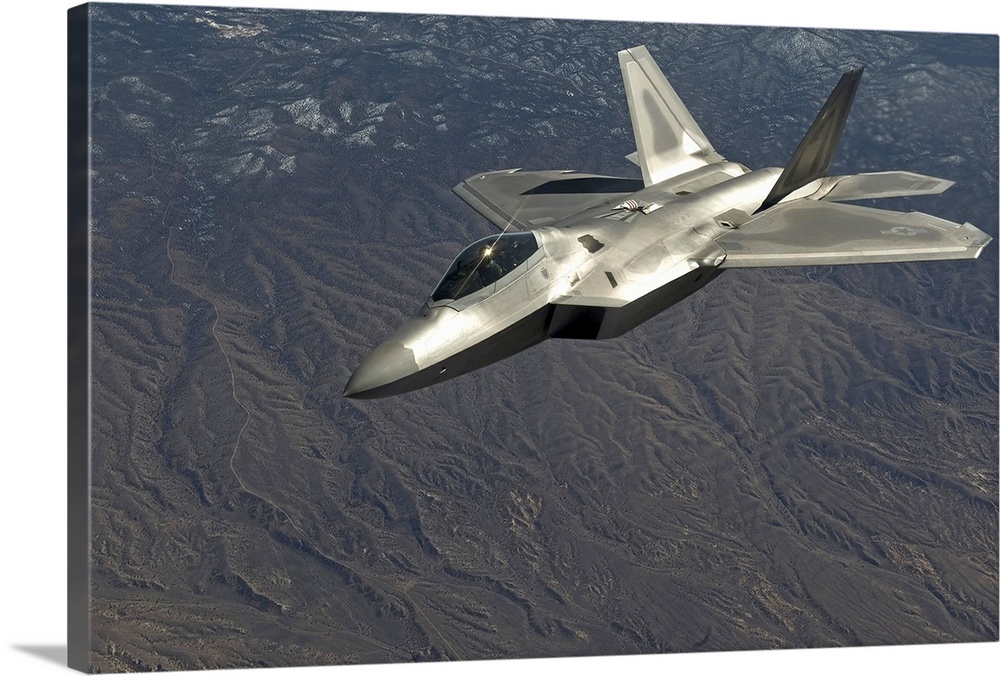 March 2, 2011 - A U.S. Air Force F-22 Raptor flies over the Nevada Test and Training Range for a training mission during R...
