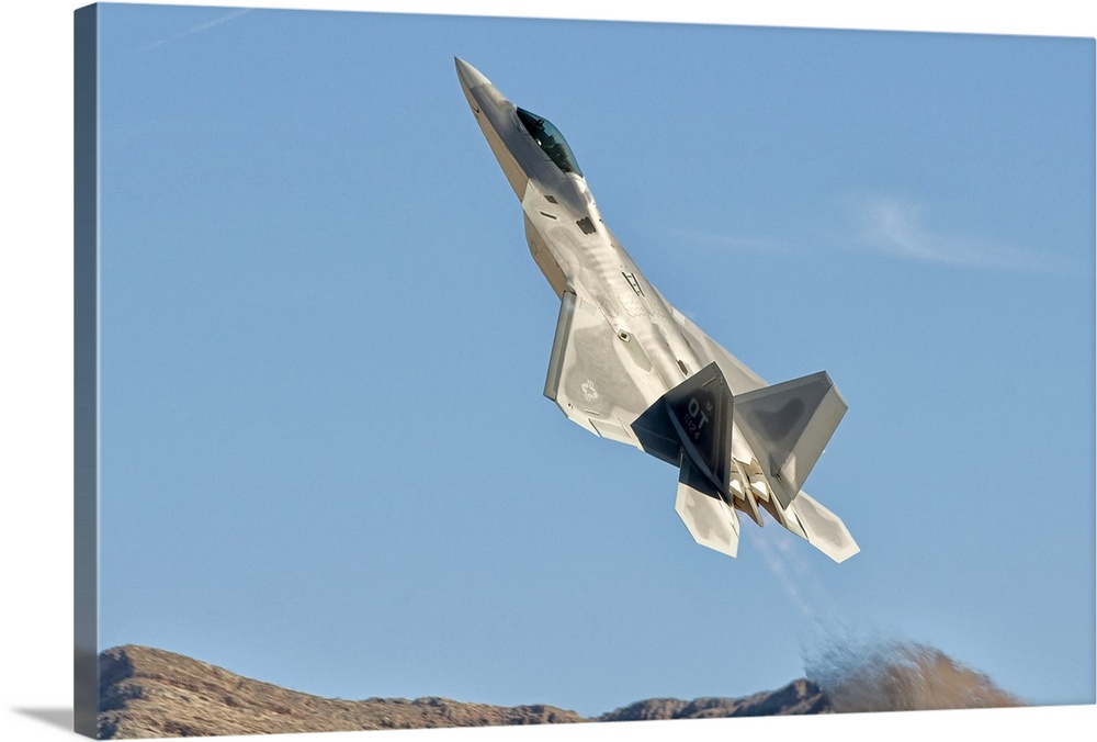 A U.S. Air Force F-22 Raptor takes off from Nellis Air Force Base, Nevada.