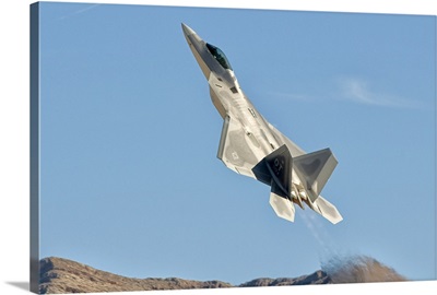 A U.S. Air Force F-22 Raptor takes off from Nellis Air Force Base, Nevada
