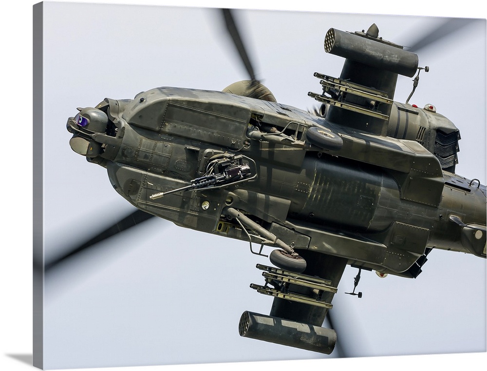A U.S. Army AH-64D Apache Longbow pulls into a turn over Cleveland, Ohio.