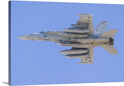 A U.S. Navy E/A-18G Growler climbs out of Nellis Air Force Base, Nevada.