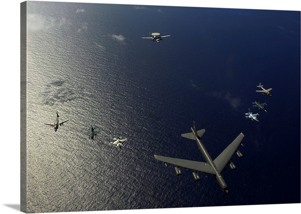 February 15, 2010 - A U.S. Air Force B-52 Stratofortress aircraft leads a formation of two F-16 Fighting Falcon aircraft, ...