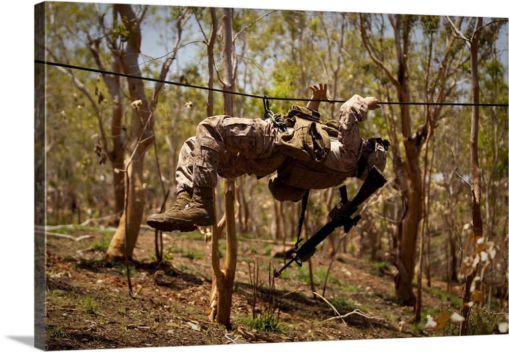 October 11, 2012 - A U.S. Marine participates in a gorge crossing demonstration during exercise Crocodilo 2012 in Metinaro...