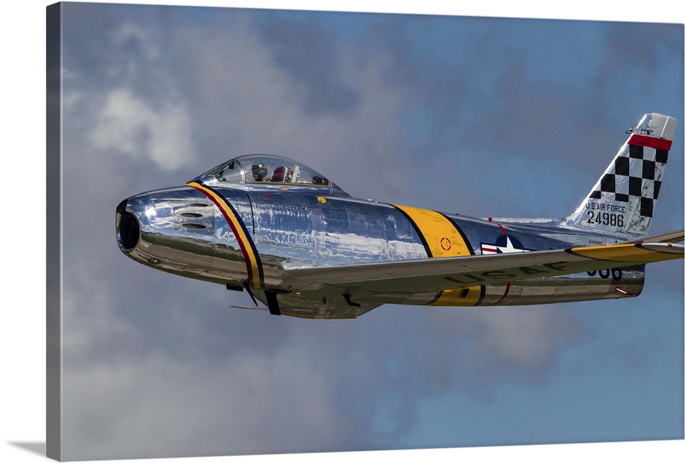A vintage F-86 Sabre of the Warbird Heritage Foundation takes off from Waukegan, Illinois.