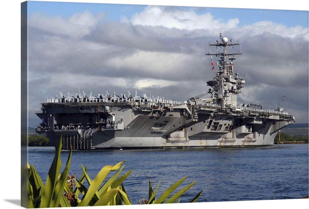 Aircraft carrier USS Abraham Lincoln arrives in Pearl Harbor, Hawaii.