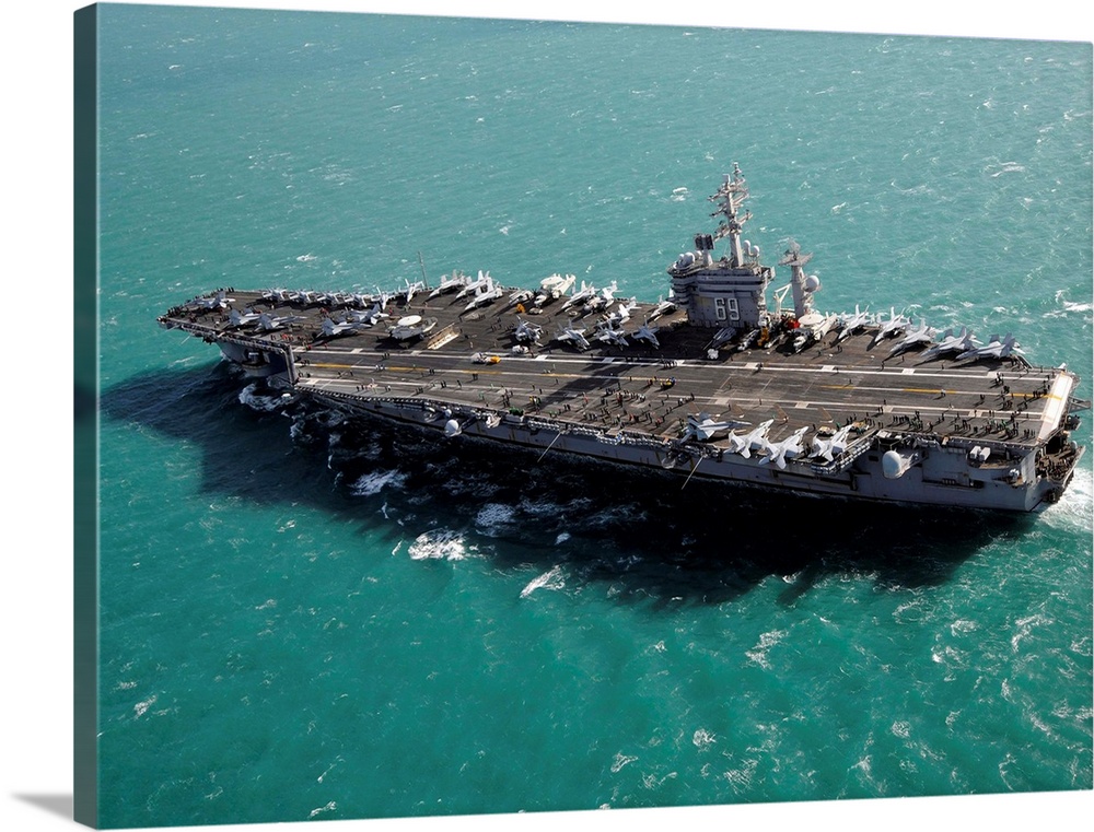 Aircraft carrier USS Dwight D. Eisenhower sails through the Mediterranean Sea.