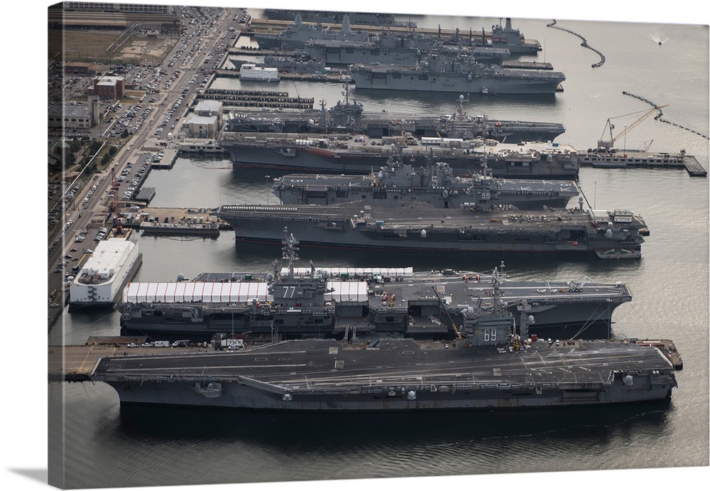 Aircraft carriers in port at Naval Station Norfolk, Virginia.