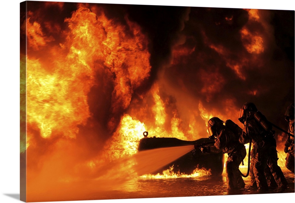 Aircraft rescue and firefighting Marines extinguish a fuel fire.