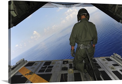 Airman Observes The Waters Of The Gulf Of Mexico From A C-130 Hercules