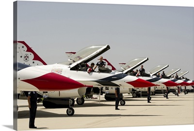 Airmen conduct preflight preparations on F-16 Thunderbirds