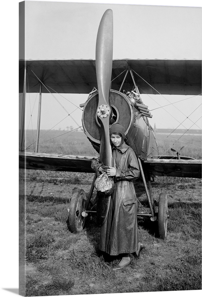 American aviator Katherine Stinson in front of her biplane.