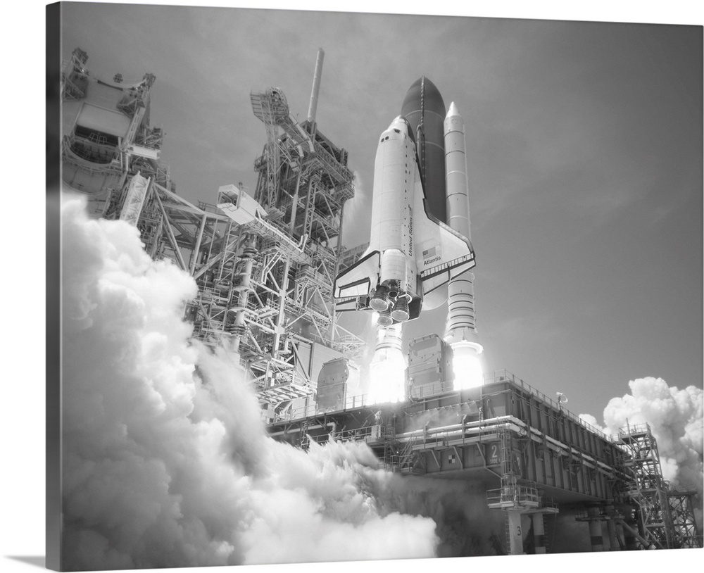 American history photo of Space Shuttle Atlantis blasting off.