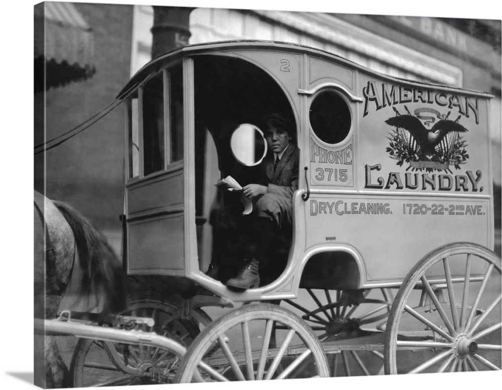 American history photograph of a young wagon delivery boy, Birmingham, Alabama, 1914.