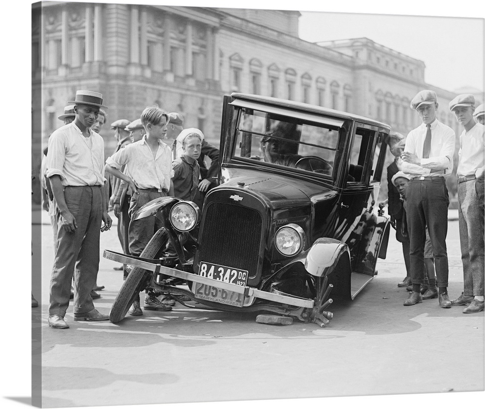 American history photograph of a vintage car broken down in the street, Washington D.C., 1923.