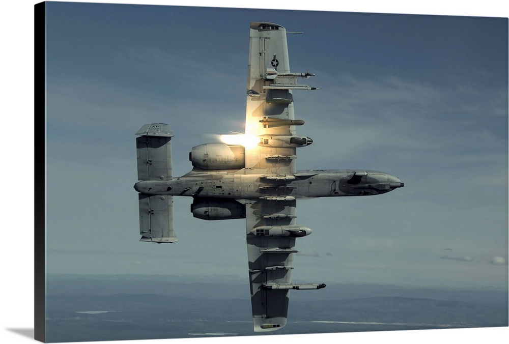 An A-10 Warthog breaks over the Pacific Alaska Range Complex during live fire training.