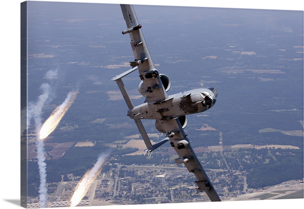 An A-10C Warthog popping flares while breaking away.