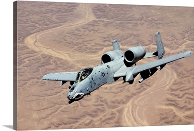 An A10 Thunderbolt soars above the skies of Iraq