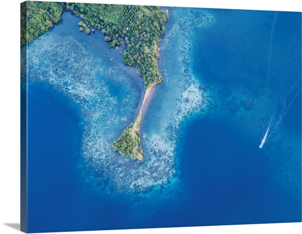 An aerial view of the beautiful scenery of Lembeh Strait shows healthy reefs.