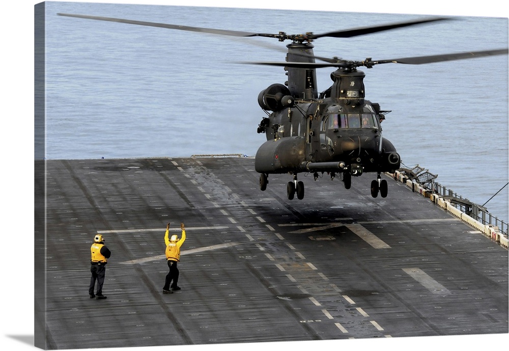 Pacific Ocean, October 9, 2012 - An Army MH-47G Chinook medium assault helicopter conducts deck landing qualifications abo...