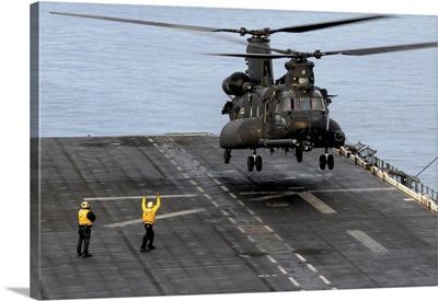 An Army MH-47G Chinook Conducts Deck Landing Qualifications