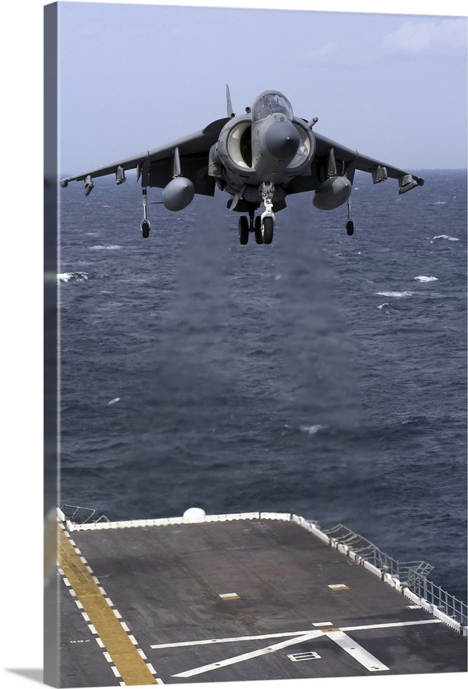 February 14, 2005 - A U.S. Marine Corps AV-8B Harrier II assigned to VMA 223 prepares to land on the flight deck of USS Na...