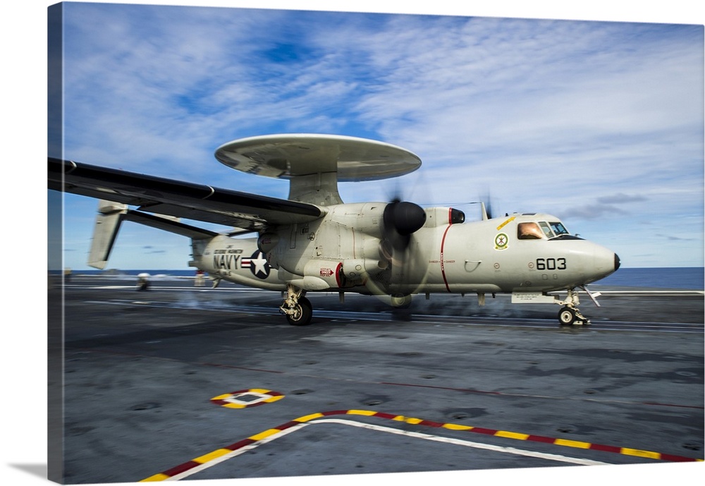 An E-2C Hawkeye launches from the flight deck of USS George Washington.