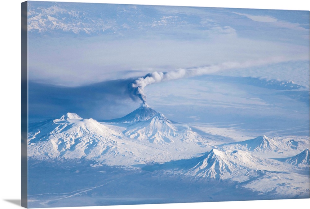 An eruption plume emanating from Kliuchevskoi, one of the many active volcanoes on the Kamchatka Peninsula. The plume, lik...