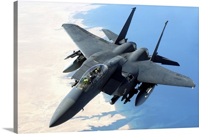 An F-15E Strike Eagle flies over Iraq during a combat mission