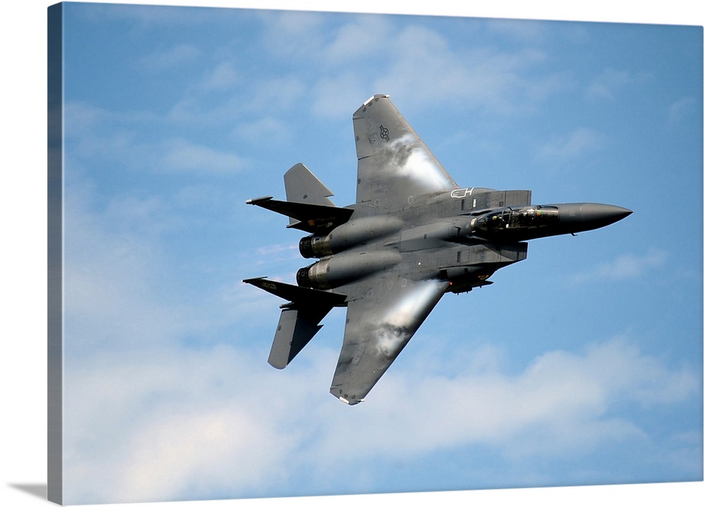 An F-15E Strike Eagle soars through the sky.