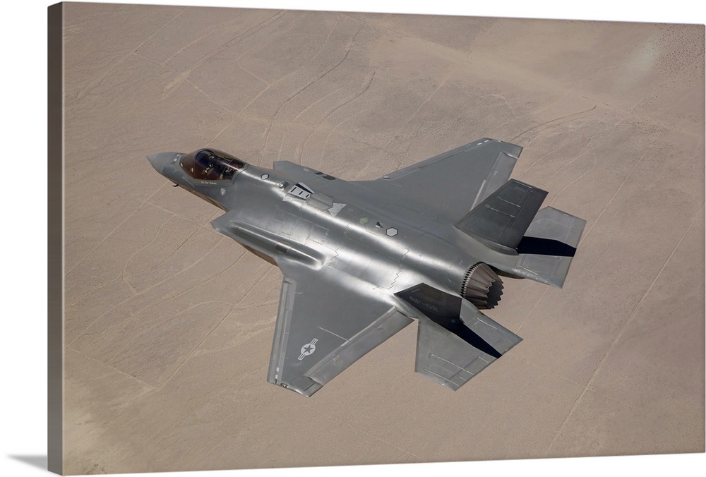 June 11, 2014 - An AF-2, the second production F-35 Lightning II of the U.S. Air Force, flies over Edwards Air Force Base,...