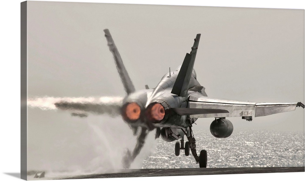 Persian Gulf, October 30, 2011 - An F/A-18C Hornet takes off from USS George H.W. Bush.