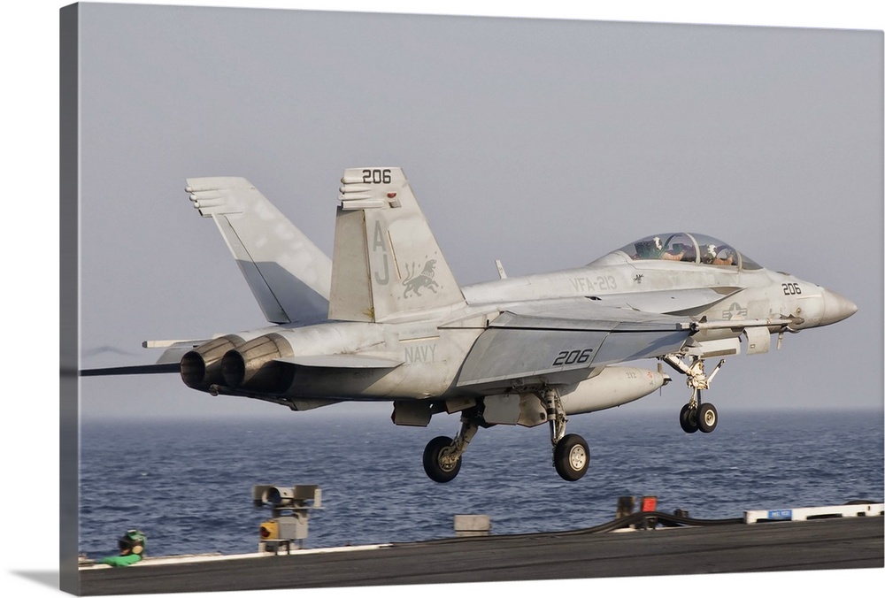 Persian Gulf, October 30, 2011 - An F/A-18F Super Hornet takes off from the flight deck of USS George H.W. Bush.