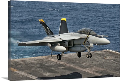 An F/A-18F Super Hornet prepares to land aboard USS Eisenhower