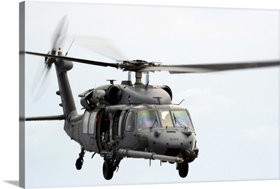 An HH60 Pave Hawk helicopter conducts search and rescue operations
