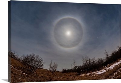 An Ice Crystal Halo Around The Waxing Gibbous Moon