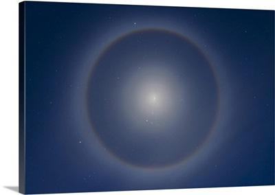 An Ice Crystal Halo Around The Waxing Gibbous Moon