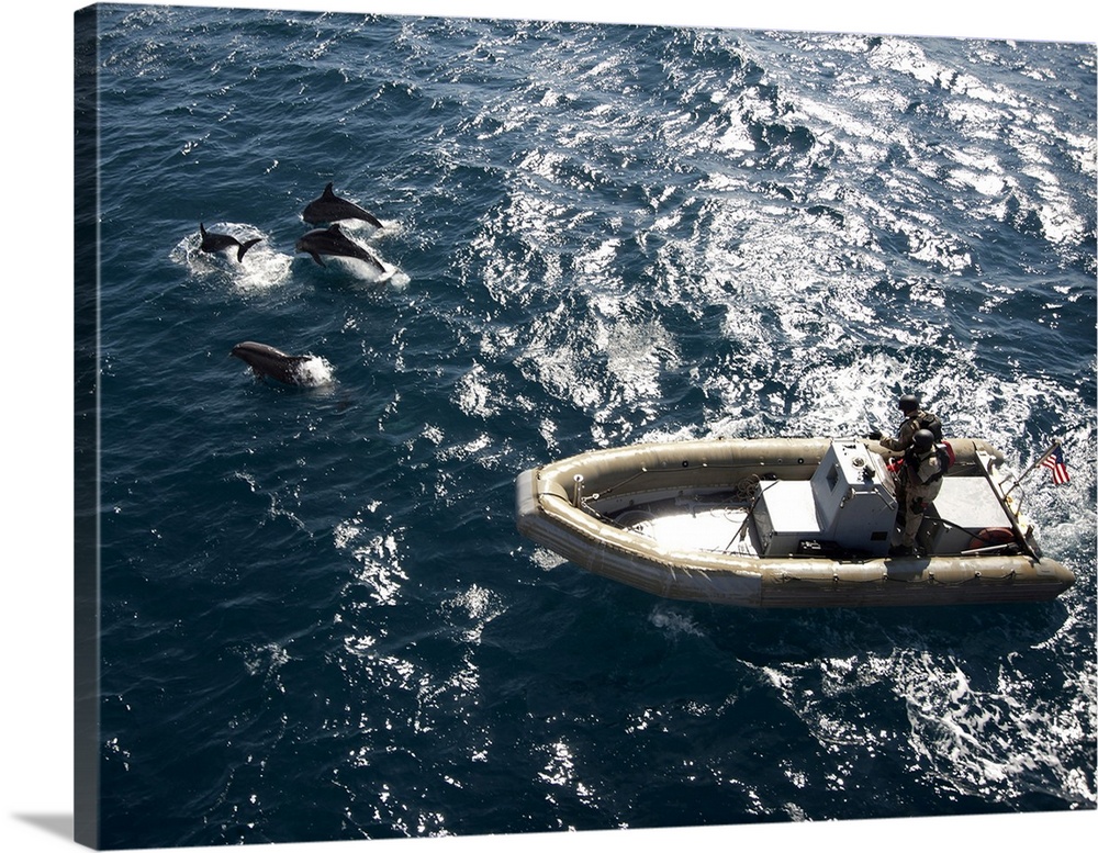 Atlantic Ocean, January 30, 2012 - Rigid-hull inflatable boats from the Arleigh Burke-class guided-missile destroyer USS J...