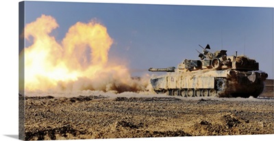 An M1A1 Abrams Main Battle Tank Fires Its 120 Mm Smoothbore Cannon