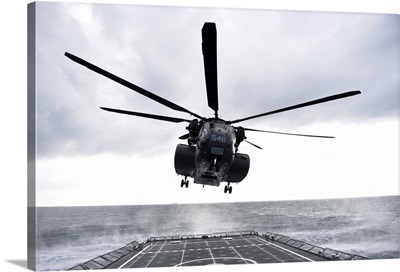 An MH-53E Sea Dragon Helicopter Prepares To Land On The Flight Deck