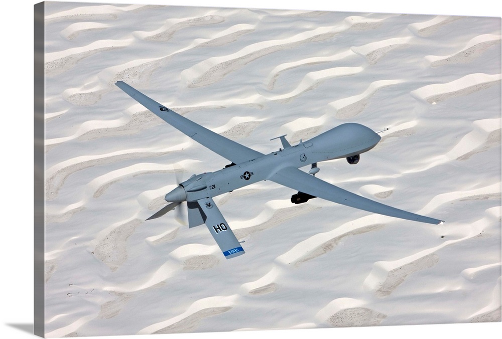 An MQ-1 Predator flies a training mission over the White Sands National Monument in Southern New Mexico.