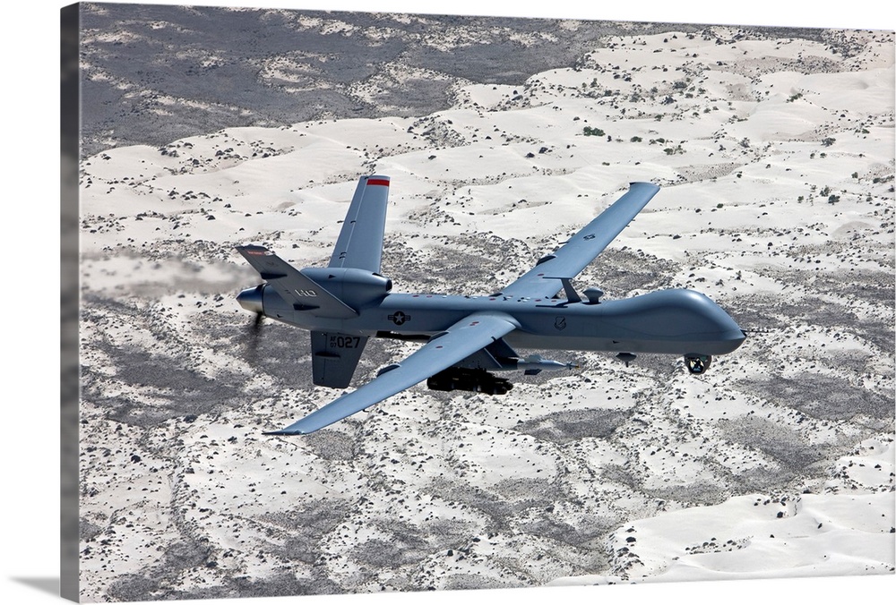 An MQ-9 Reaper flies a training mission over the White Sands National Monument in Southern New Mexico.