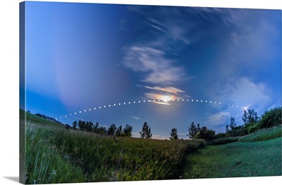 Arc Of The Summer Moon In Alberta, Canada