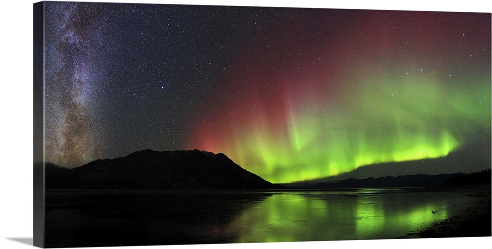 Aurora borealis Milky Way, Big Dipper, and a shooting star above Kluane Lake, Yukon, Canada.