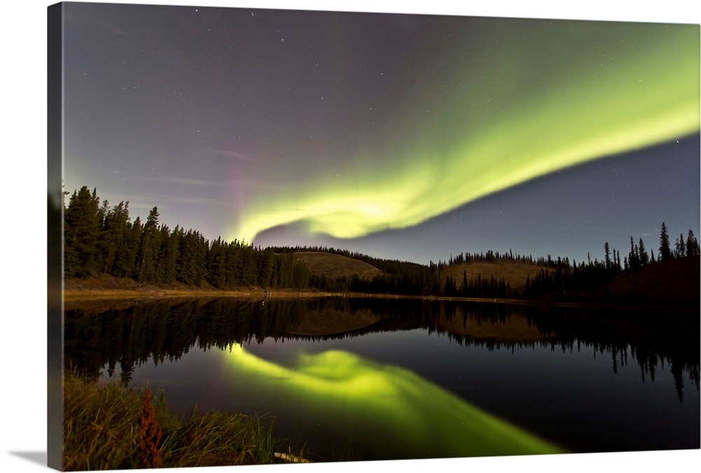 Aurora borealis over Hidden Lake, Yukon, Canada.