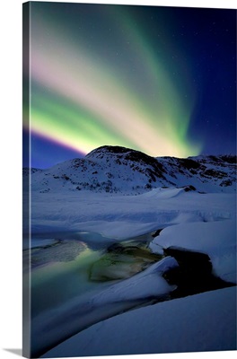 Aurora Borealis over Mikkelfjellet Mountain in Troms County, Norway