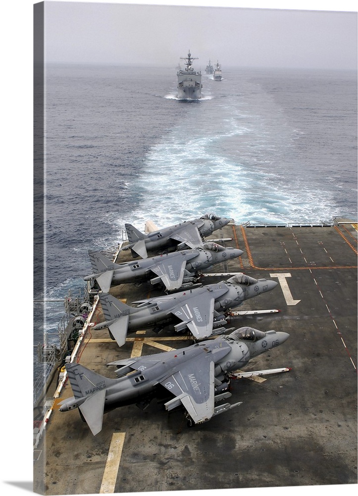 AV-8B Harriers line the flight deck of amphibious assault ship USS Tarawa.